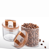 Set-2-Tarros-con-Tapa-de-Acacia-400ml-y-550ml-Bergner